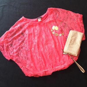 Coral lace blouse with tank top.